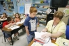 Teacher Cindy Tucker helps 2nd-grade student Preston Hall with a reading and writing assignment at McDowell Elementary School (Floyd County).Photo by Amy Wallot, May 28, 2008