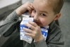 Kindergarten student Jason Gordon carries milk to his classroom at Bridgeport Elementary School (Franklin County).Photo by Amy Wallot, March 12, 2008