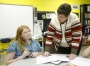 Charlotte Webb helps 5th-grade student Brianna Partin with a written response question from the book "Genies Don't Ride Bicycles" the Academy, an after-school program at Middlesboro Intermediate School (Middlesboro Ind.) Jan. 19, 2011.
Photo by Amy Wallot