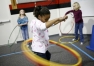 Fourth-grade students Mercedes Kirtley, Makayla Stevenson and Sarah Lindsey hula-hoop during an AR reading party at Newton Parrish Elementary School (Owensboro Ind.) March 12, 2010.
Photo by Amy Wallot