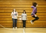 Seventh-grade student Shana Shelton jumps rope while Devin Tirey and Aimee McGraw wait to jump in during Owsley County High School physical education class March 26, 2010.
Photo by Amy Wallot