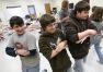 Dylan Young, Daniel Pitman and Adam Chaney dance the Virginia Reel during Meredith Braun's Dance and Drama class at North Middle School in Pulaski County Jan. 18, 2008.
Photo by Amy Wallot