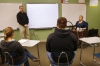 With the help of sign language interpreter Russell Anderson, left, Lee Alan Roher, right, teaches algebra at the Kentucky School for the Deaf.  Photo by Amy Wallot, Jan. 15, 2015