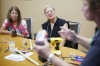 Jessica Bowling, an arts and humanities teacher in Bath County, and Laura Wilson, a music teacher in Clark County, listen as instructor Donna Lamb demonstrates how to build a cantar. Photo by Amy Wallot, July 13, 2015