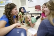 Madison Southern High School (Madison County) students Rachael Miller, left, and Sierra Lainhart,play a game with a small group at Silver Creek Elementary School (Madison County). Silver Creek students pictured are Reese Brinegar, Emmerson Coffey, Kendall Sumner and Kaleigh Sumpter. Photo by Amy Wallot, May 8, 2012