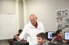 Greg Conley, the lead Project Lead the Way teacher at Marion County High School, talks to 8th-grade student Dayton Sims during an introduction to STEM class at Marion County Area Technology Center. Conley said he wants students in the class to gain an understanding of whether engineering is for them or whether they are suited for a similar career. Photo by Megan Gross, Oct. 15, 2018