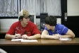 Graves County High School juniors Matthew Forrest and Kendrick Ross practice interview questions during a resume and interview workshop run by Krystal Johnson at the Mayfield/Graves Area Technology Center.