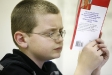 Fifth-grade student Jared Salyers reads