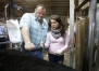 Jeff Arnett instructs Montgomery County High School sophomore Rylee Stafford on how to give a calf a shot. Photo by Amy Wallot, April 11 , 2013