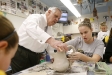 Education Commissioner Terry Holliday helps 7th-grade student Sarah McDowell with her clay pitcher during Gena Maley\'s art class at Murray Middle School (Murray Independent). The students had to create a functional clay piece. Photo by Amy Wallot, Jan. 11, 2012