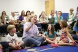 Helen Wheelock tells an interactive story to incoming kindergarten students as teachers from around the state observe during the Next Generation Arts Academy at Model Laboratory Elementary School (Madison County).