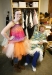 Sophomore Helen Merritt and junior Aaron Clark display a few of the costumes stored in the costume shop at Owensboro High School (Owensboro Ind.). The small room is filled with costumes, hats, wigs and other accessories students can use to transform themselves for performances. Photo by Amy Wallot, Oct. 19, 2011