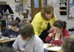 Jenn Crase helps Cassady Crabtree during pre-algebra class at South Oldham Middle School (Oldham County) Feb. 7, 2011. Crase is a recipient of the Presidential Award for Excellence in Mathematics and Science Teaching. Photo by Amy Wallot