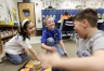 Third-grade students Valerie Santander, Branden Phillips and Joseph Ryan play the word game Blurt! during center time at Perryvillle Elementary School (Boyle County). Photo by Amy Wallot, March 25, 2014