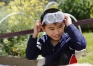 Third-grade student Austin Huynh gets ready to drill while making a house for mason bees. The students are hoping to attract the bees to pollinate their garden.  Photo by Amy Wallot, April 28, 2015