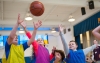 Poage Elementary School students battle for a tipped ball during a game of noonball. The game was invented as a way to help students stay active in the winter when the temperature becomes too cold to go outside for recess and was designed to include all students, not just those with good basketball skills. Photo by Bobby Ellis, Nov. 29, 2016