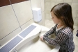 Second-grade student Elizabeth Wilson washes her hands at Richardsville Elementary School (Warren County). The sink uses solar panels to work. Photo by Amy Wallot, March 2011