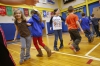 Second-grade students Madison Howard and Heidi Hicks swing each other while square dancing in a collaboration class with P.E. teacher John Hazlett and music teacher Amy Harrod. Photo by Amy Wallot, March 19, 2015