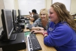 Kamala Combs helps Marissa Hilgerson with English IV work during the Diploma Recovery Academy at Shelby County High School. Hilgerson is the first student in the program to receive her diploma. Photo by Amy Wallot, April 25, 2012