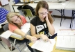 Sophomores Layla Cantrell and Hope Maynard help each other during Bobby Allen\'s honors geometry class at Sheldon Clark High School (Martin County) Sept. 7, 2011.Photo by Amy Wallot