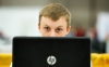 Brayden Muncy, from the Martin County Area Technical Center, looks over his computer during the web design competiton at the 2016 SkillsUSA Championship in Louisville. Photo by Bobby Ellis, June 22, 2016