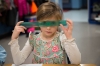 Talyn Weatherly, a 2nd-grader at Southwest Calloway Elementary (Calloway County), looks through a ruler while measuring different objects in her class. Photo by Bobby Ellis, Dec. 8, 2016
