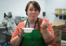 Katie McClain, the library media specialist at Farristown Middle School (Madison County), tries a bowl of white chicken chili before the start of lunch on Teacher Tuesday. McClain's recipe for the chili was selected and prepared by the cafeteria staff to be served on Teacher Tuesday. Photo by Bobby Ellis, Nov. 28, 2017