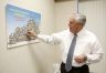 Commissioner Terry Holliday pins Hart County on a map in his office, completing his goal to visit all 174 Kentucky school districts. Photo by Amy Wallot, Jan. 16, 2013