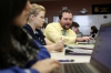 Food science teacher John Hammond helps junior Hannah Blair with her assignment. The students were working in groups, using Google docs, to create a safety plan for a sandwich company.  Photo by Amy Wallot, Jan. 8, 2015​