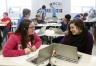 Freshman Caitlyn Binkley and junior Megan Edlin use interactive maps to review geography. Photo by Amy Wallot, Jan. 8, 2015​