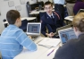 Freshman John-Paul Cesare, Jordan Dixon and Amanda Brock use interactive maps to review geography during David Mudd's AP human geography class. Photo by Amy Wallot, Jan. 8, 2015​
