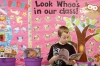 Conner Stroud looks for a book to read after finishing an assignment in Whittany Shaw's class. Photo by Amy Wallot, April 20, 2015