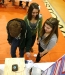 Andrew Davis and Kelcie Denny check out Karyna Davis\' mini tornado during the 8th-grade science fair at Williamstown Junior High School (Williamstown Ind.) Jan. 18, 2012. Photo by Amy Wallot
