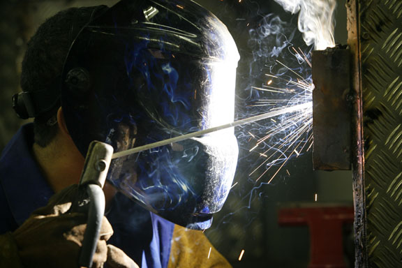 Sophomore Tevon Clay vertical-up welds during Randy Shewmaker's class at the Franklin County Career and Technical Center Dec. 1, 2010. Photo by Amy Wallot