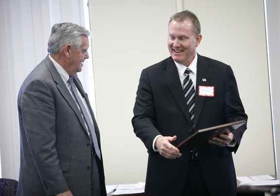 Superintendent Sam Sanders receives the Dr. Johnnie Grissom Award on behalf of the LaRue County School District from Commissioner of Education Terry Holliday during the Kentucky Board of Education meeting Dec. 8, 2010 in Frankfort, Ky. Photo by Amy Wallot