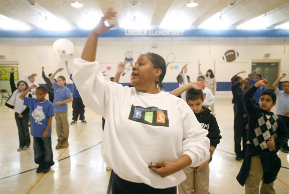 Dance educator Harlina Churn-Diallo teaches 4th-grade students during class at Lincoln Elementary School (Jefferson County) Jan. 14, 2011. Photo by Amy Wallot