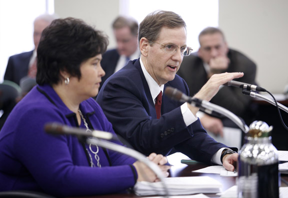 Ken Draut and Rhonda Simms speak with the Kentucky Board of Education about the new accountability model during the board's meeting in Frankfort Feb. 2, 2011. Photo by Amy Wallot