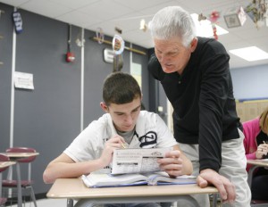 James Willoughby helps 8th-grade student Hunter Hackney with an outline about the American Expansion during U.S. History class at Dixon Elementary School (Webster County) Feb. 4, 2011. Photo by Amy Wallot