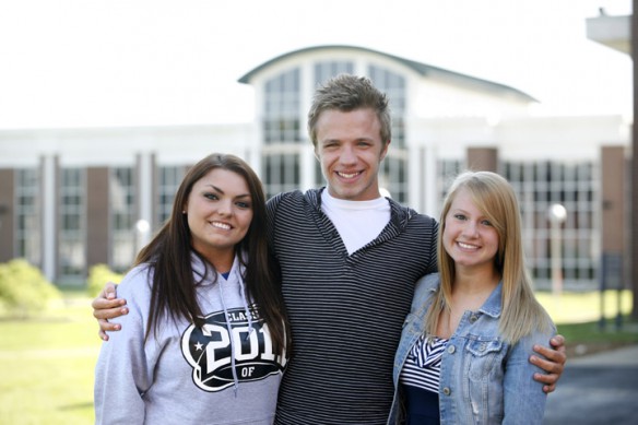 Four seniors graduated from Commonwealth Middle College this year with a diploma and an associate degree: Ali Greer, left, Jeremy Sneed, Jackie Lile and Katie Young (not pictured). All four plan on attending college in the fall. Photo by Amy Wallot, April 29, 2011
