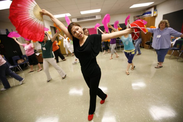 Chinese dance instructor Shuling Fister leads a classroom of teachers in the Chinese Yangge Dance during the Next Generation Academy at Bowen Elementary School (Jefferson County). Photo by Amy Wallot, June 22, 2011