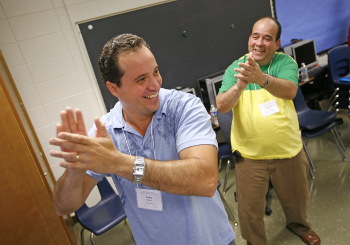 Jeffersontown Elementary School (Jefferson County) teacher Pedro Toledo and Fairdale Elementary School (Jefferson County) teacher Mariano Polo learn to flamenco during the Next Generation Academy at Bowen Elementary School (Jefferson County). Both are Spanish teachers at their schools. Photo by Amy Wallot, June 22, 2011