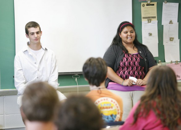 Sophomore Tiara Brand, right, gives a humorous and informative speech about freshman Mason Stamm, left, for her first speech of the year during Steve Meadows Speech 1 class at Danville High School (Danville Ind.). Photo by Amy Wallot, Aug. 16, 2011