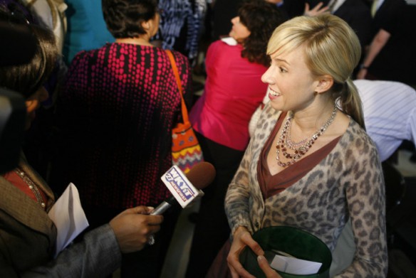 Kimberly Shearer, an English teacher at Boone County High School, speaks with a reporter after being named Kentucky Teacher of the Year. Photo by Amy Wallot, Oct. 18, 2011