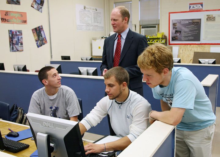 Dale Winkler, executive director of career and technical education, visits with students at the Franklin County Career and Technical Center. Photo by Tim Thornberry