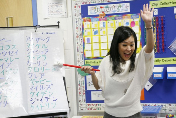 Miko Momozono teaches Japanese to Beth Heimann's kindergarten class at Picadome Elementary School (Fayette County). Photo by Amy Wallot, Jan. 10, 2012