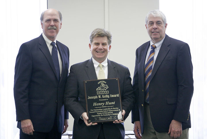 Henry Hunt, center, receives the Joseph Kelly W. Award from the Kentucky Board of Education. Also pictured are Joseph Kelly, left and KBE chairman David Karem. Photo by Amy Wallot, Feb. 1, 2012