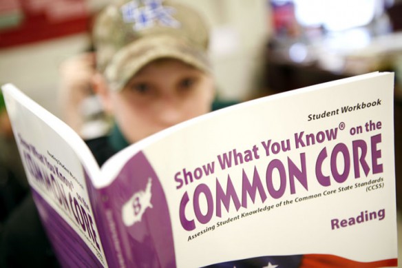 Tyler Wright reviews a common core standards workbook to prepare for the K-PREP tests during Stephanie Sanders’ 8th-grade reading class at Page School Center (Bell County). Photo by Amy Wallot, Feb. 29, 2012