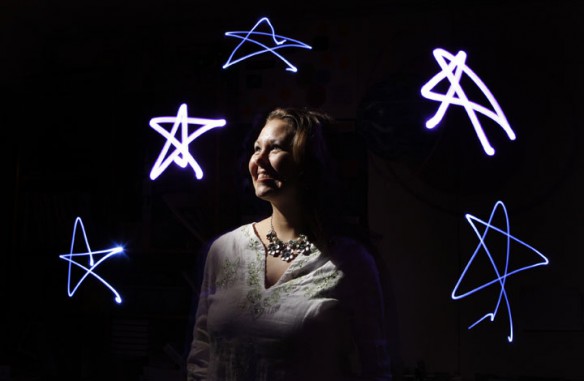 Jennifer Carter, an astronomy teacher at Rowan County Senior High School, encourages her students to analyze data to discover pulsars. Photo by Amy Wallot, March 16, 2012