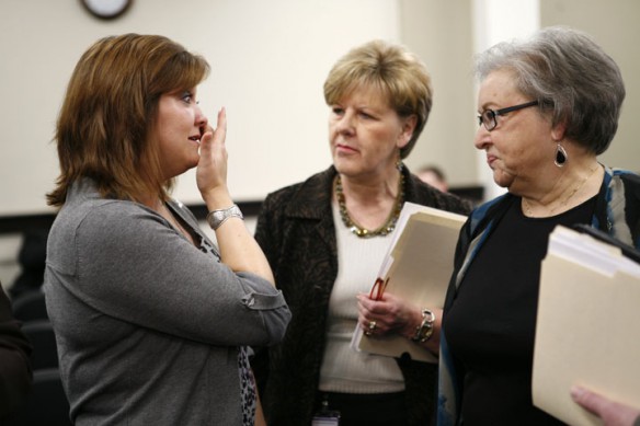 Mayfield Elementary School (Mayfield Independent) 3rd-grade teacher Kim Smith speaks with state Rep. Rita Smart, D-Richmond, and state Rep. Linda Belcher, D-Shepherdsville, after giving emotional testimony regarding teachers work hours during a House Education Committee meeting. Photo by Amy Wallot, March 13 , 2012