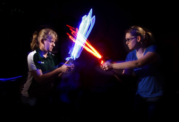 Sophomores Kara Lewis and Allison Fletcher with light painted lightsabers at Rowan County Senior High School. Photo by Amy Wallot, March 16, 2012